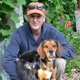 Photo of author Jeffrey B Burton with 2 dogs